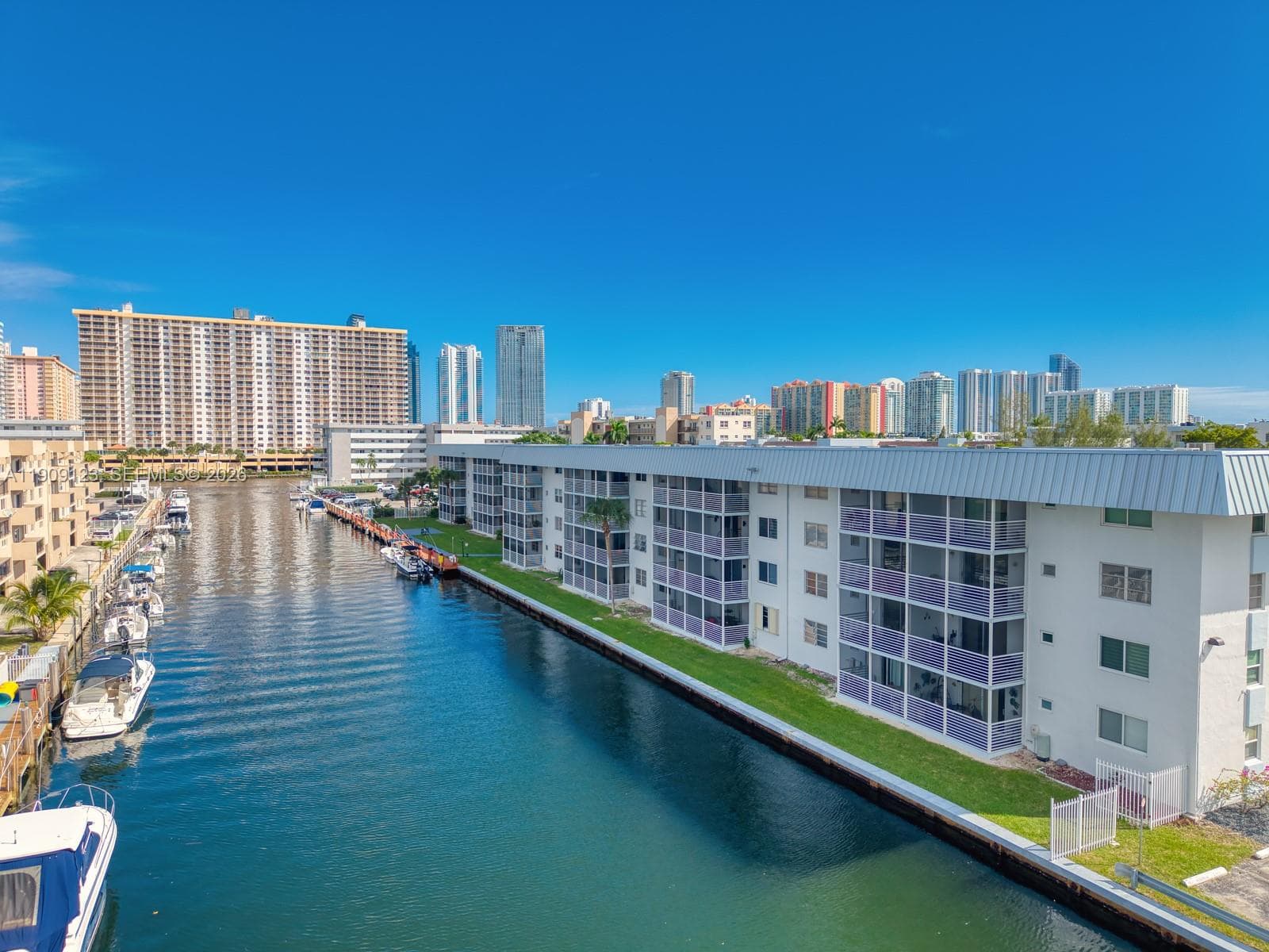 Top-floor corner unit highlighted—minutes from Sunny Isles & Aventura Mall.