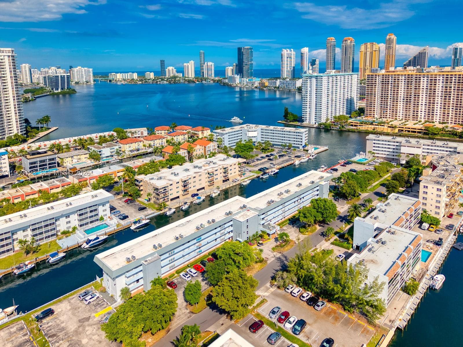 Panoramic aerial showcasing proximity to the Intracoastal and the stunning Miami skyline.