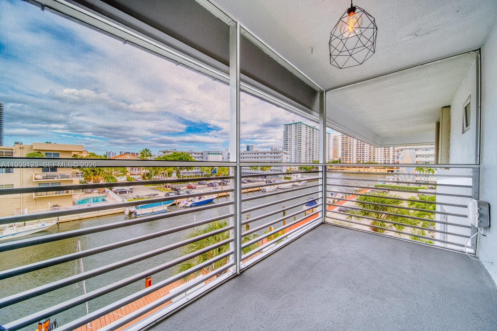 Screened balcony with plenty of space to unwind and enjoy sunsets.