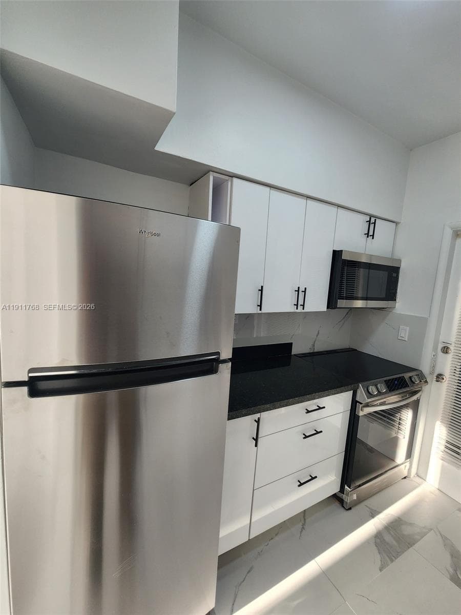 THE DUVAL 2101 NORMANDY DRIVE # 216 MIAMI BEACH FL
