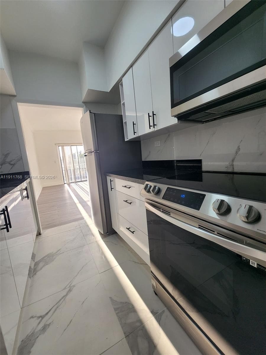 THE DUVAL 2101 NORMANDY DRIVE # 216 MIAMI BEACH FL