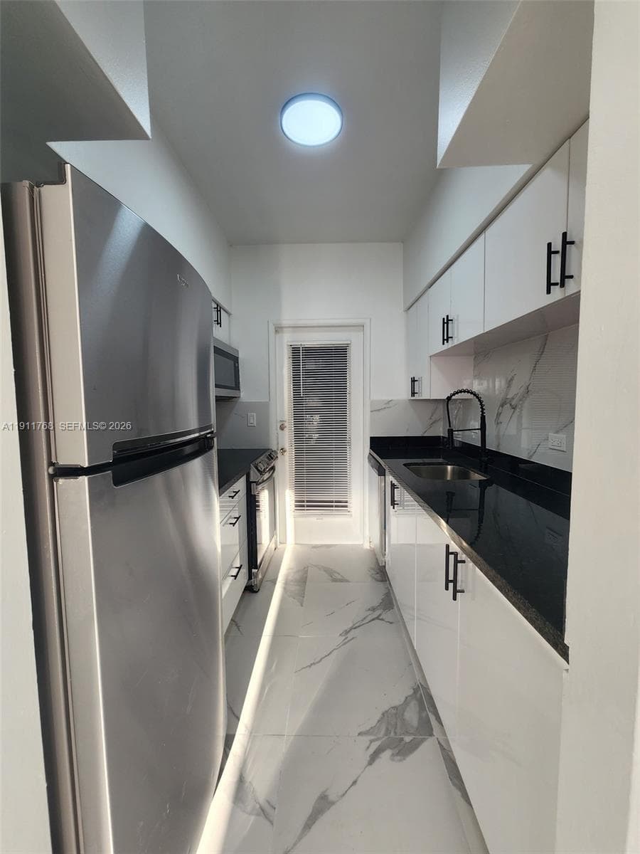THE DUVAL 2101 NORMANDY DRIVE # 216 MIAMI BEACH FL