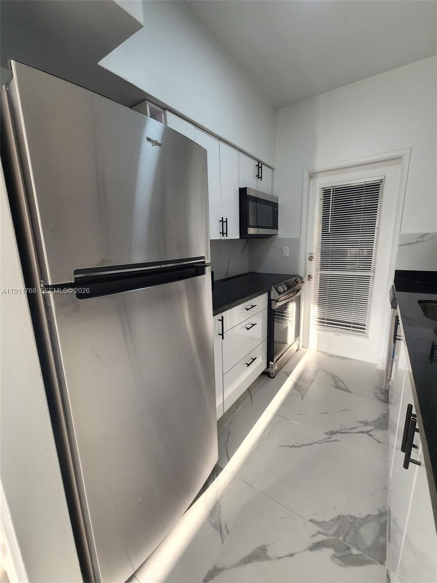 THE DUVAL 2101 NORMANDY DRIVE # 216 MIAMI BEACH FL