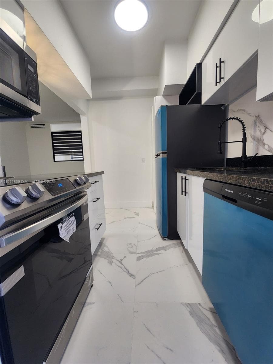 THE DUVAL 2101 NORMANDY DRIVE # 103 MIAMI BEACH FL 33141