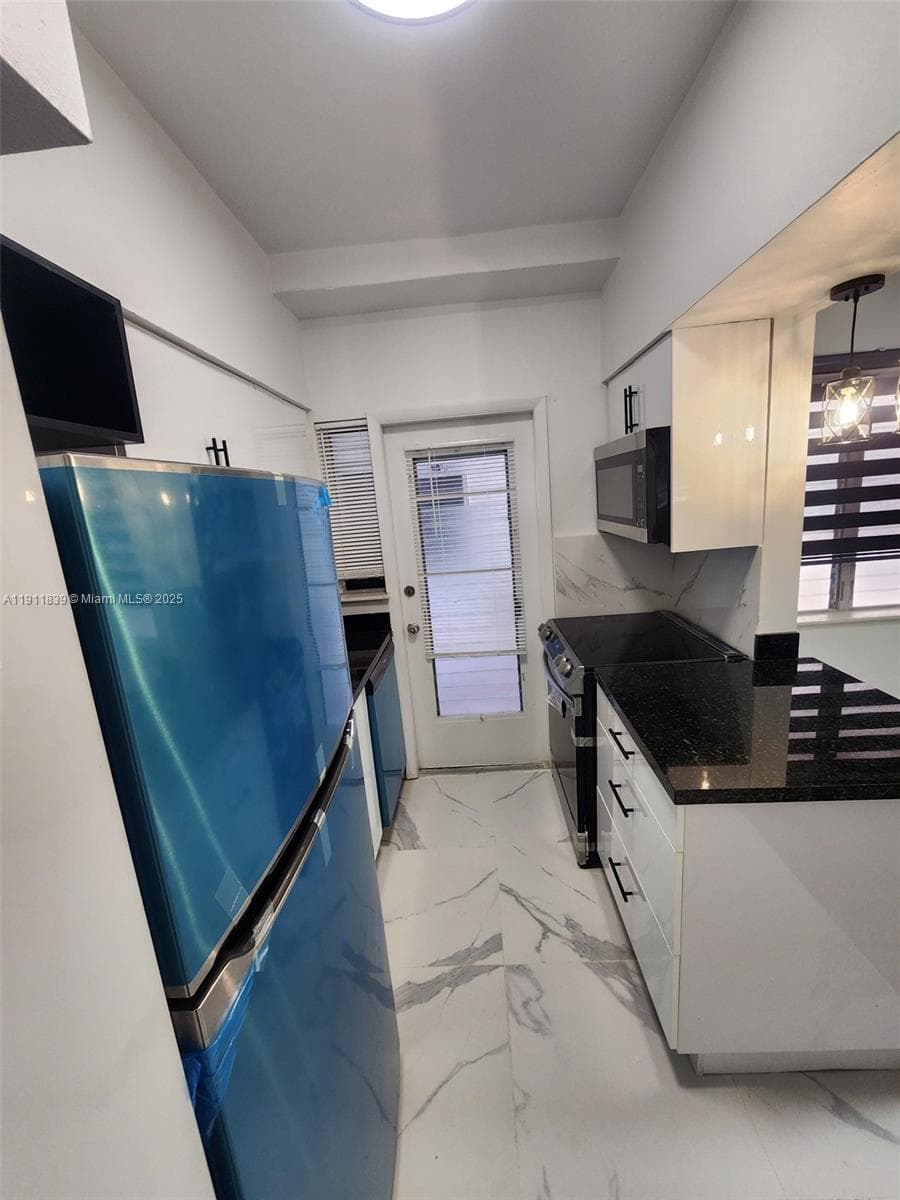THE DUVAL 2101 NORMANDY DRIVE # 103 MIAMI BEACH FL 33141
