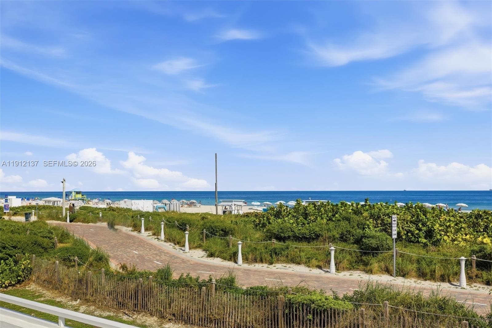 Just outside your door, enjoy direct access to Miami Beach’s iconic oceanfront boardwalk — a vibrant pathway perfect for morning jogs, scenic bike rides, or leisurely strolls along the shoreline. Lined with lush tropical greenery and bordered by soft sand dunes, this beautifully maintained trail connects you to the best of South Beach living. Whether you’re cycling with ocean views, walking to nearby cafés, or simply soaking in the sea breeze, this boardwalk captures the true essence of the coastal Miami li