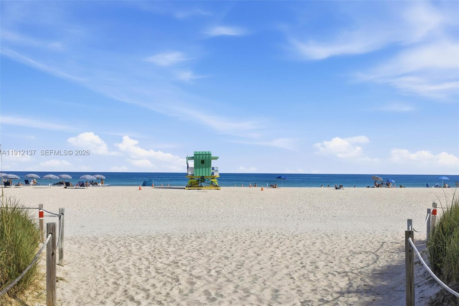 Step to the beach and feel the soft white sand beneath your feet as you walk toward the turquoise waters of the Atlantic. Lined with swaying sea grass and open to endless ocean views, this serene pathway invites you to experience the essence of Miami Beach living. Whether it’s a morning stroll at sunrise, a relaxing afternoon under an umbrella, or a sunset walk along the shoreline, this direct access offers the perfect gateway to your coastal escape.