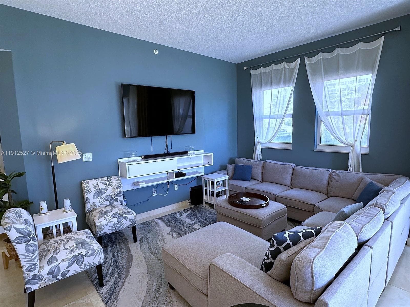 10 ft tall ceilings, with large section couch