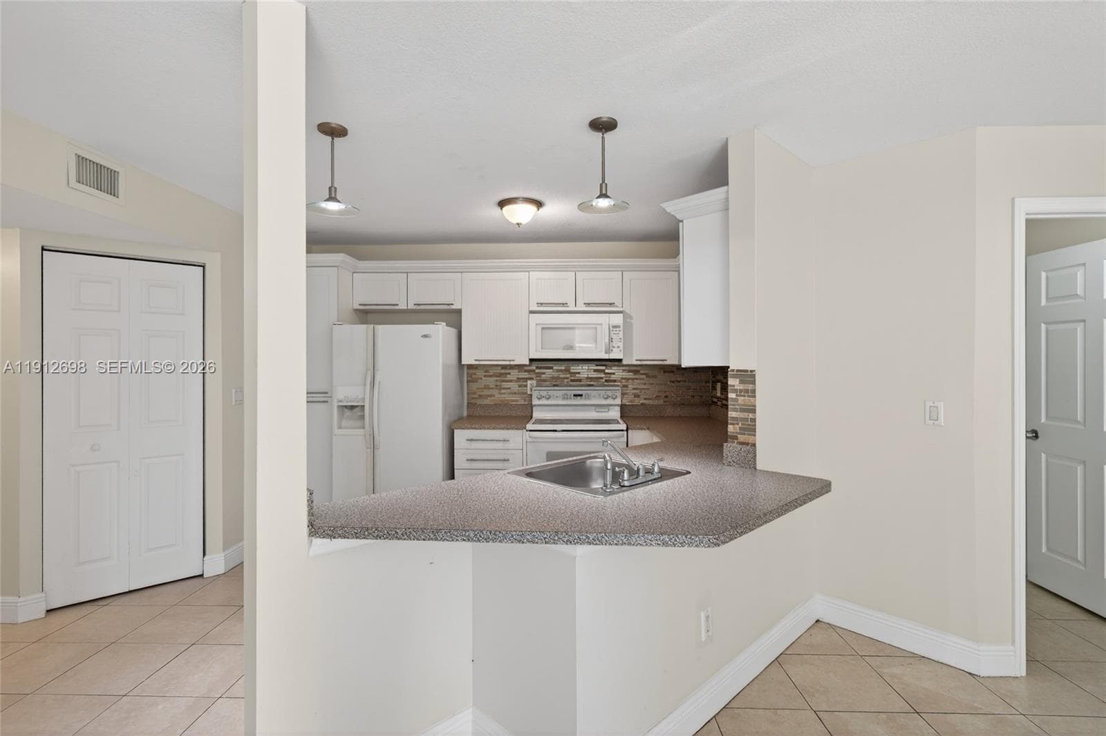 WINDWARD LAKES CONDO · #E109 in Pompano Beach - Photo 9
