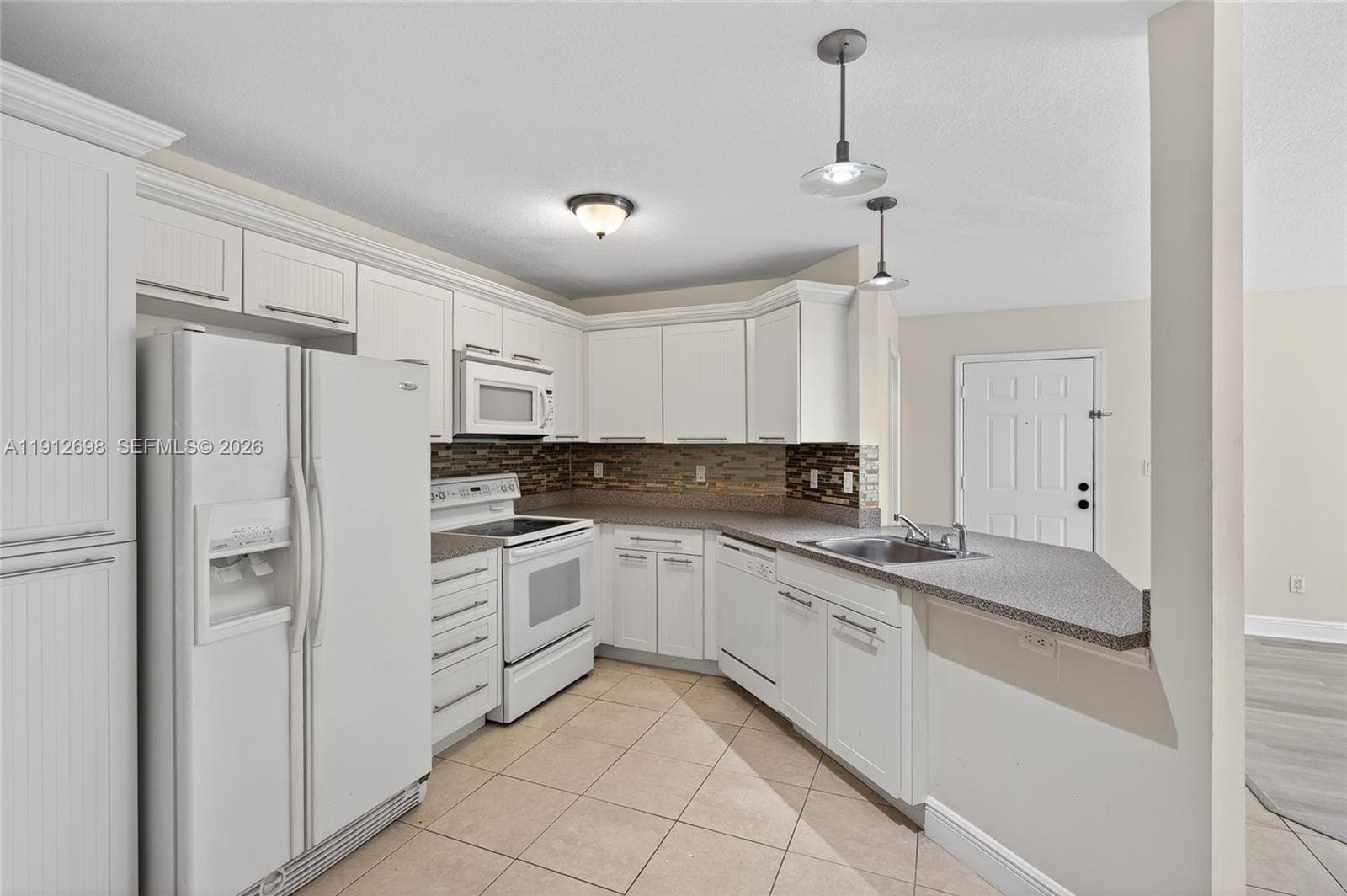WINDWARD LAKES CONDO · #E109 in Pompano Beach - Photo 8