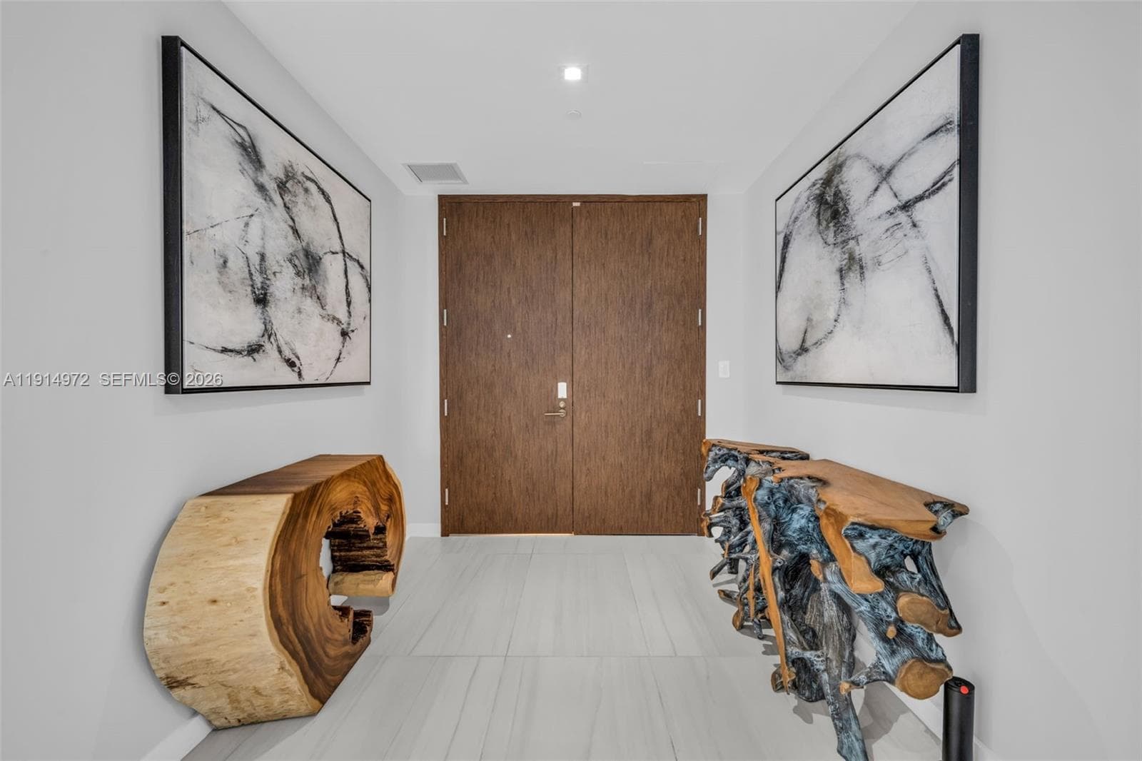 Private Elevator Foyer with cusdtom entry doors