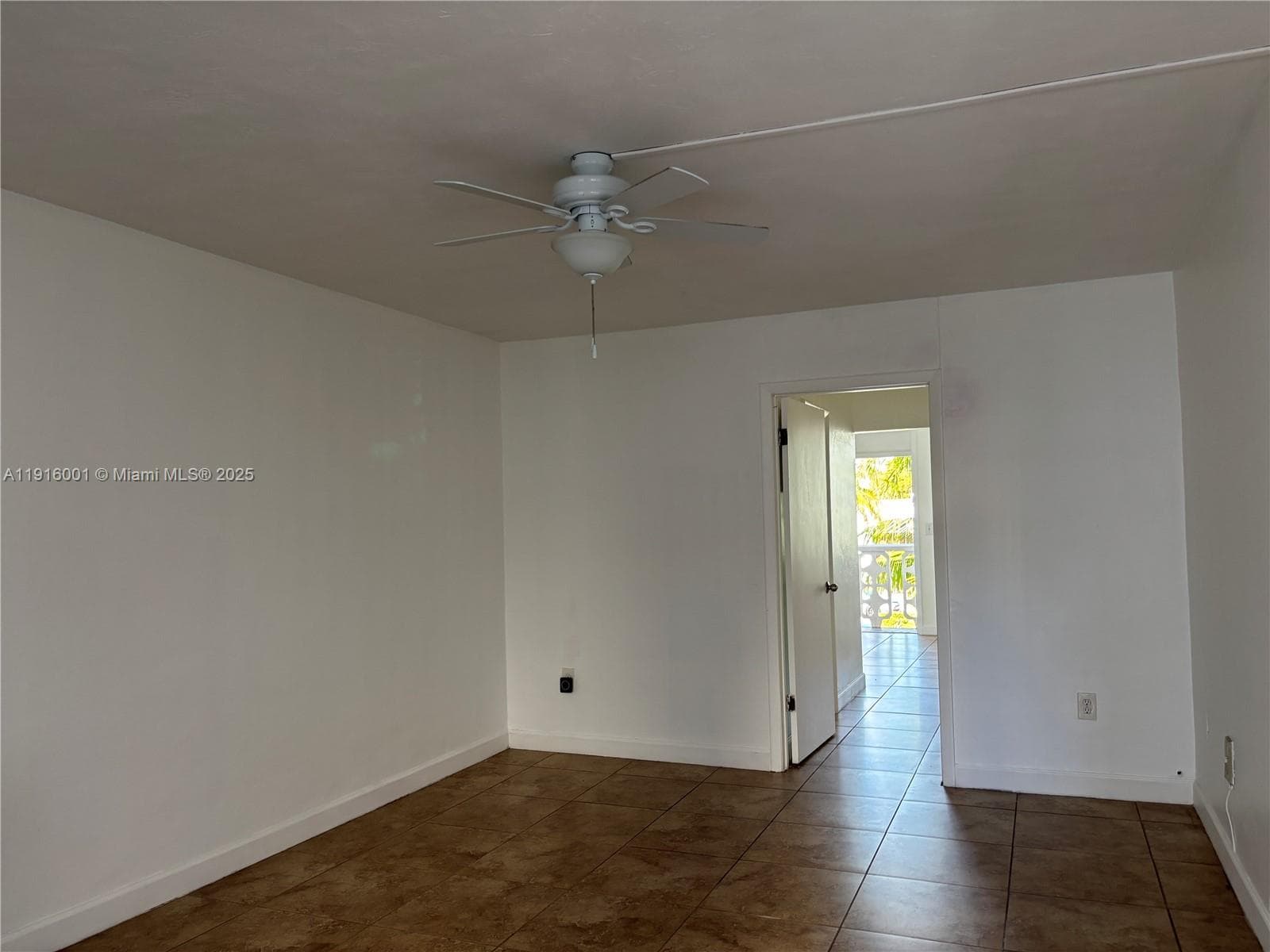 Spacious bedroom with ceiling fan and A/C