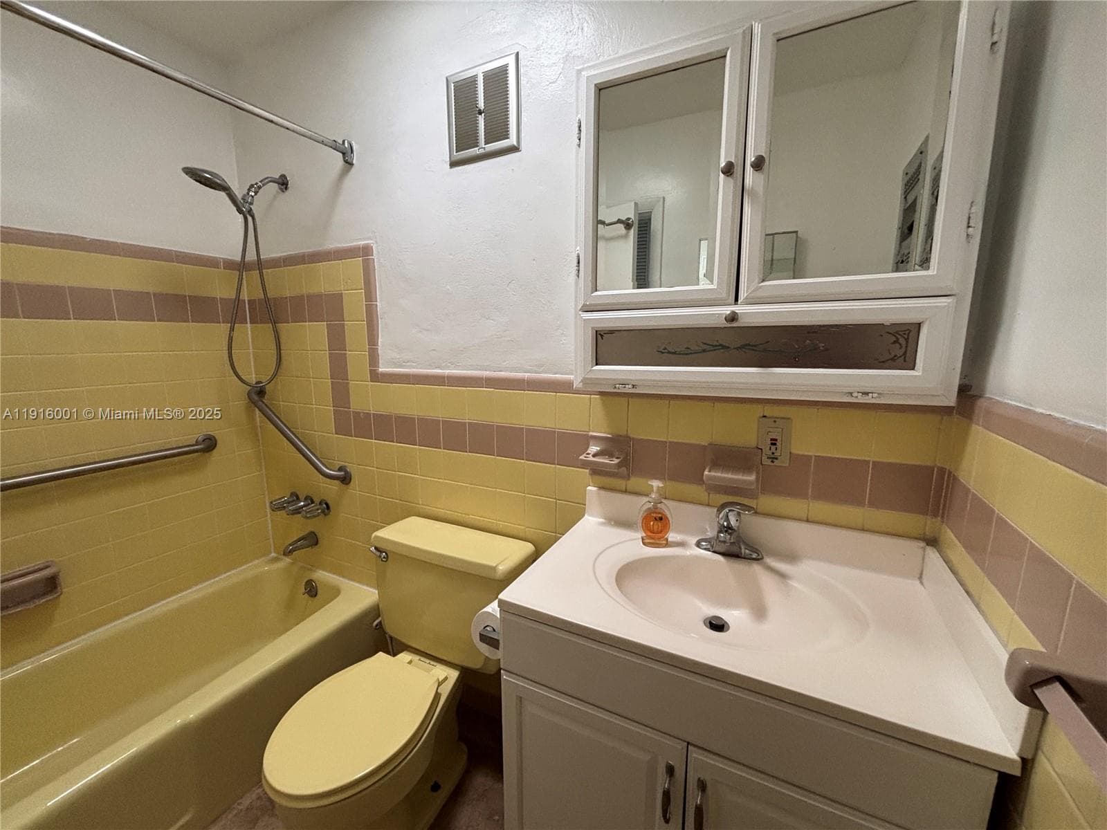Bathroom is handicap accessible and has a skylight.