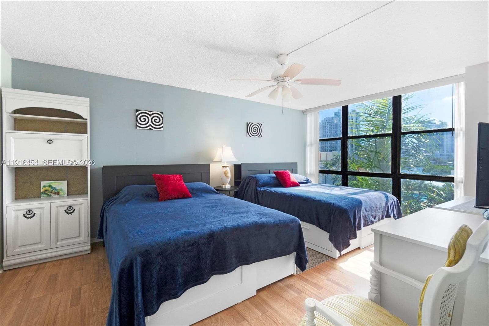 View from your balcony, overlooking the tennis courts, pool area and the Intracoastal Waterway. - Oceanview Park Condominium, Three Islands, Hallandale Beach, FL 33009. 1000 Parkview Drive, Unit #518.