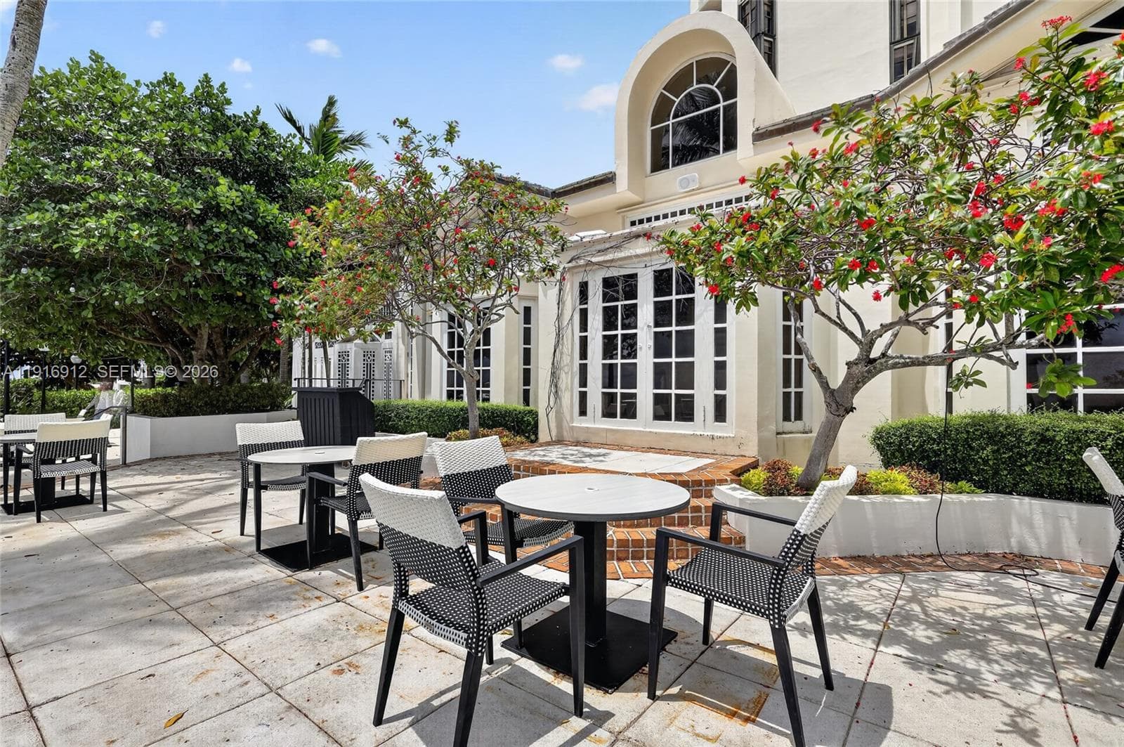 Surrounded by the sight of docked boats and sparkling waterways, the terrace provides an inviting atmosphere for morning coffee, sunset cocktails, or an evening meal under the stars. Its relaxed yet elegant setting captures the essence of waterfront living and dining at its finest.