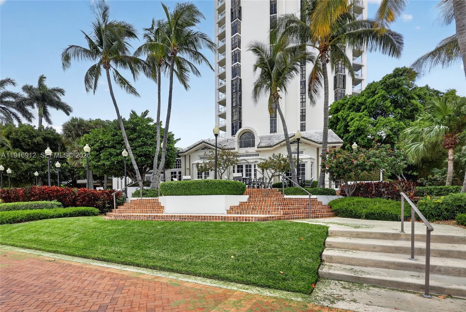 Residents and guests can enjoy serene waterfront views, lush greenery, and a relaxed resort-style atmosphere while dining indoors or on the scenic outdoor terrace. The combination of elegant surroundings, tranquil marina vistas, and vibrant landscaping creates an inviting setting ideal for casual lunches, sunset cocktails, or evening dining by the water