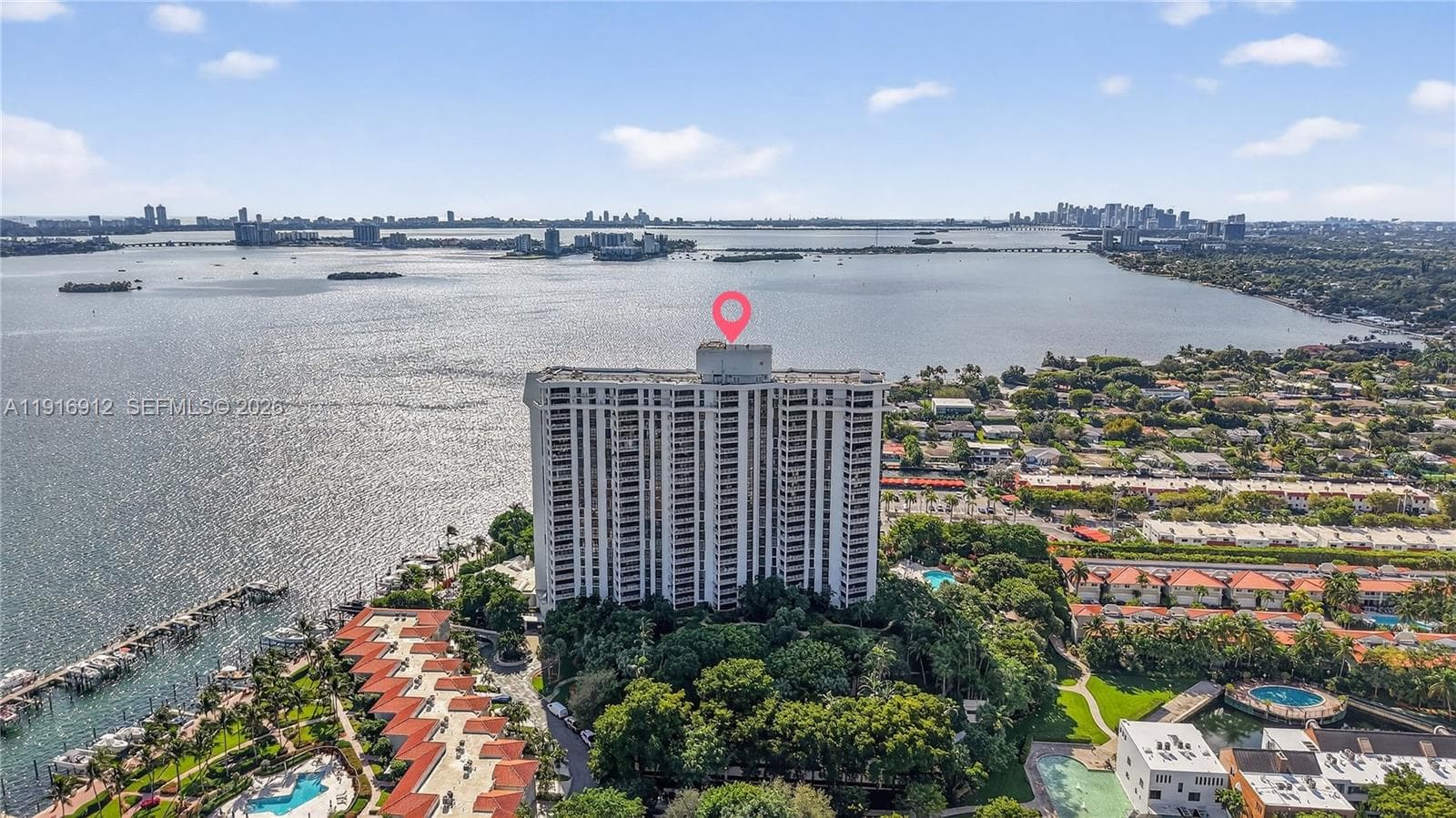 A rare combination of serene water views and dramatic skyline panoramas.