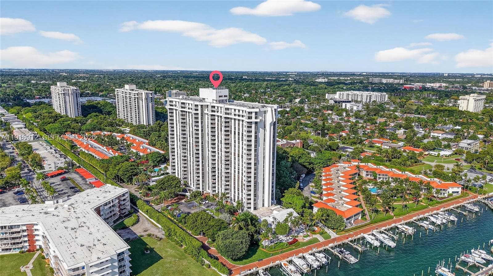 A rare combination of serene water views and dramatic skyline panoramas.