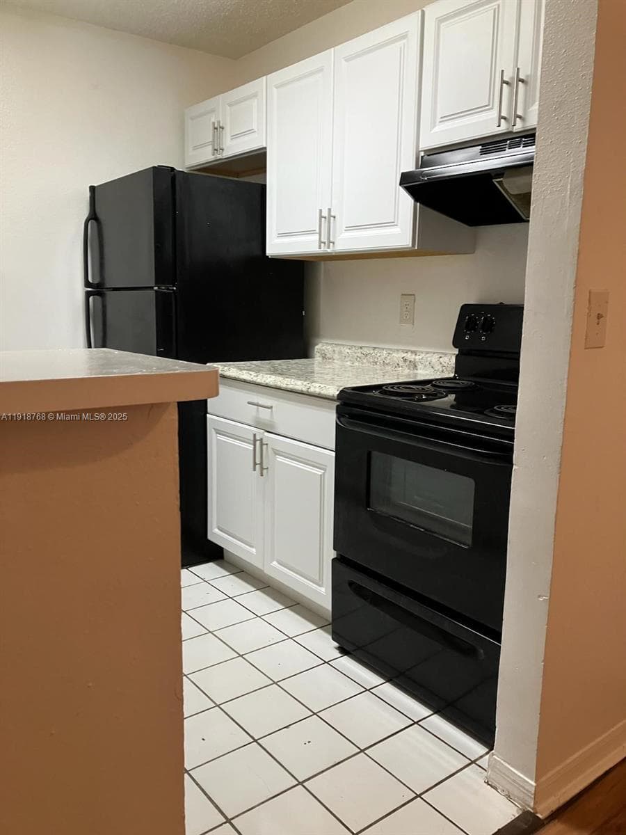 WINDWARD LAKES CONDO · #E105 in Pompano Beach - Photo 4