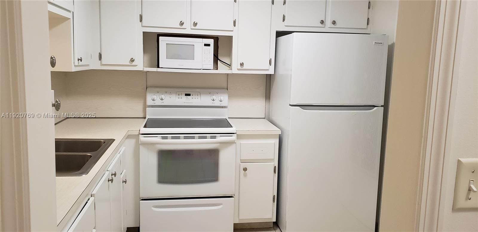 MEADOWBROOK TOWERS CONDO · #205 in Hallandale Beach - Photo 1