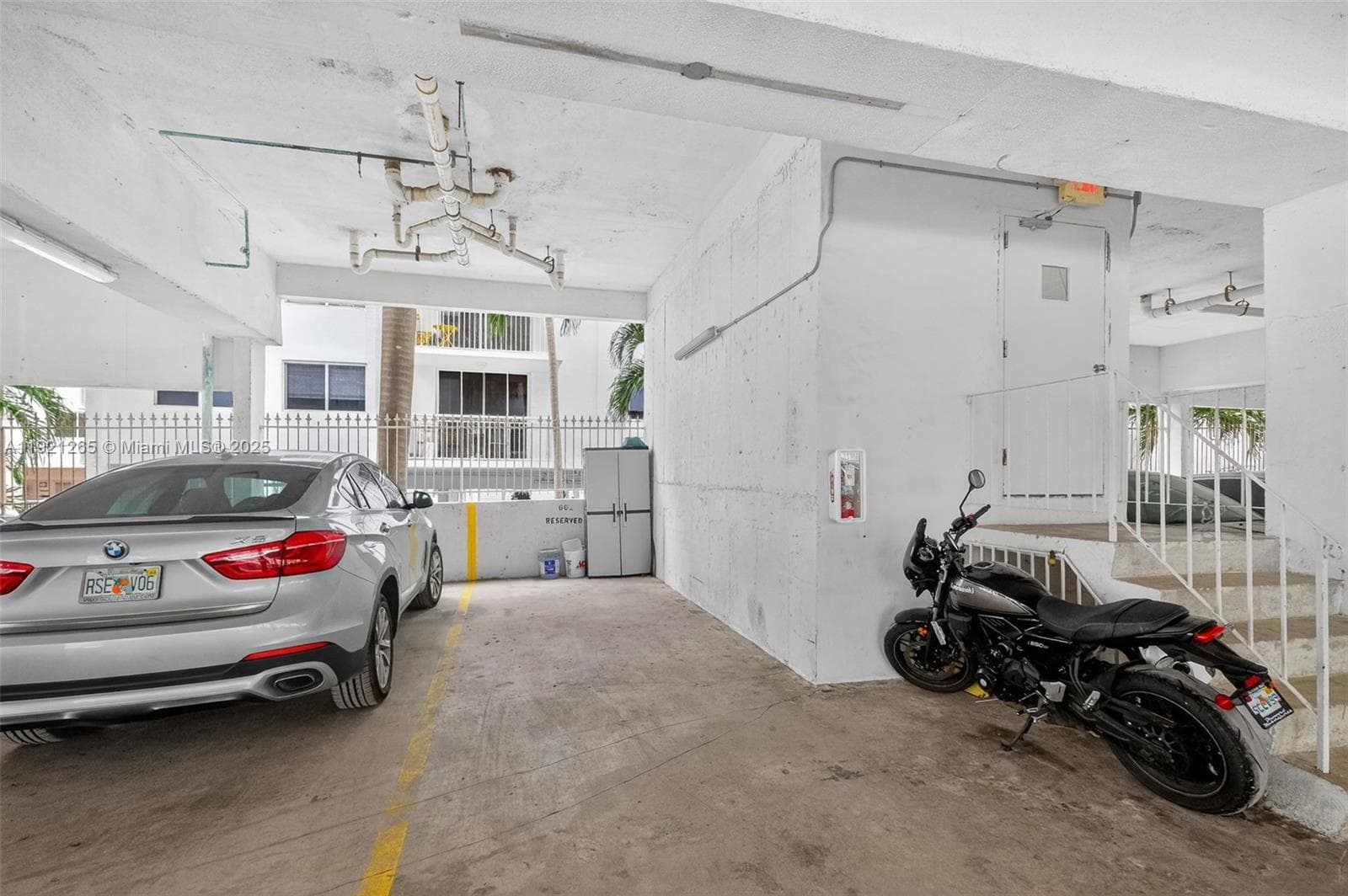 2nd floor covered garage 1 assigned parking space