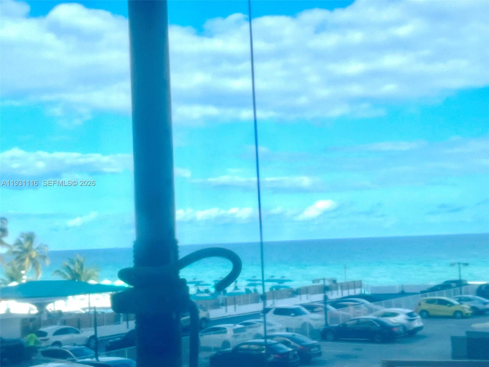 the beach through the temporary window plastic