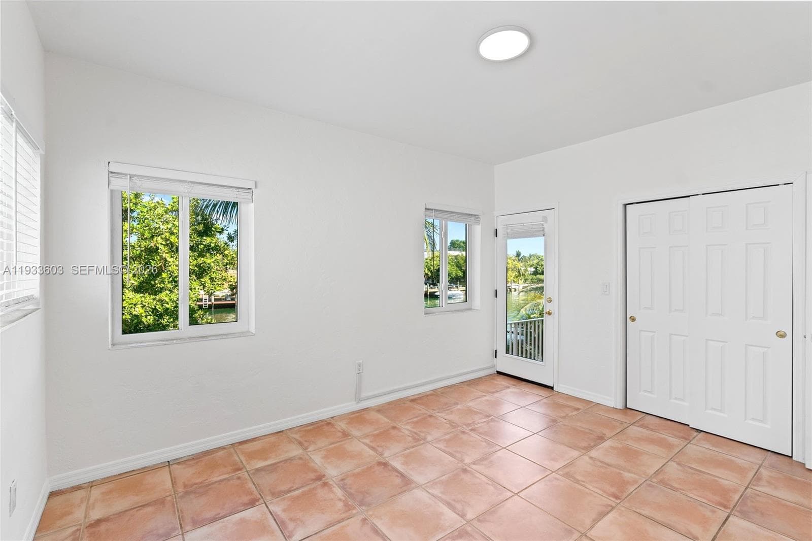 Tons of windows and Private Balcony directly on the waterfront