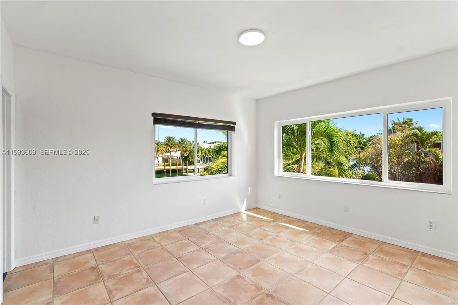 Spacious Bedroom with tons of windows and direct water views