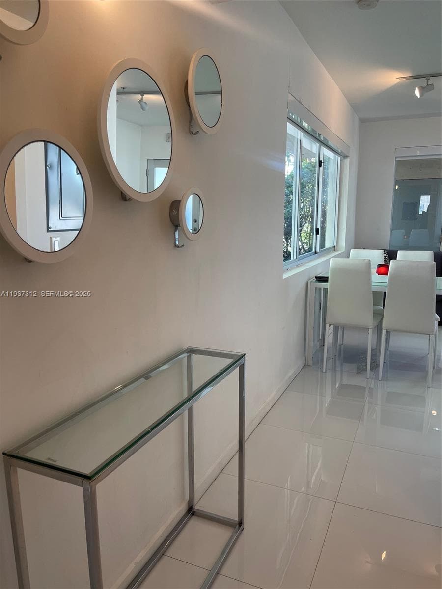 ELISA CONDO · #101 in Miami Beach - Photo 13