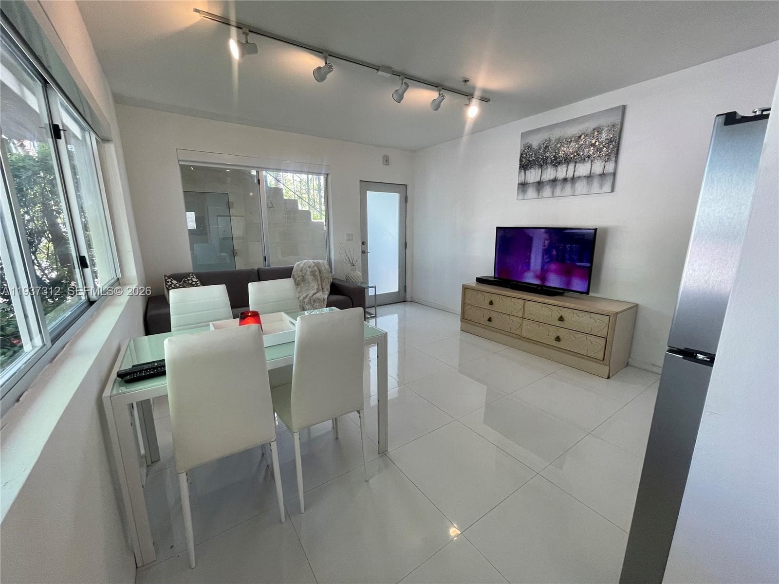 ELISA CONDO · #101 in Miami Beach - Photo 3