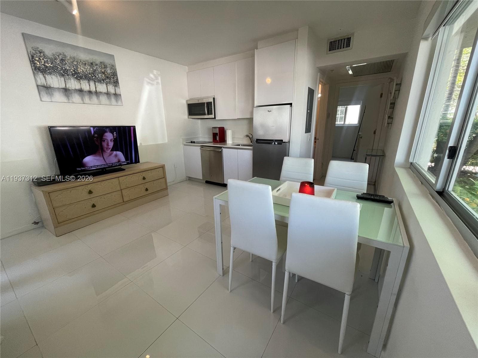 ELISA CONDO · #101 in Miami Beach - Photo 18