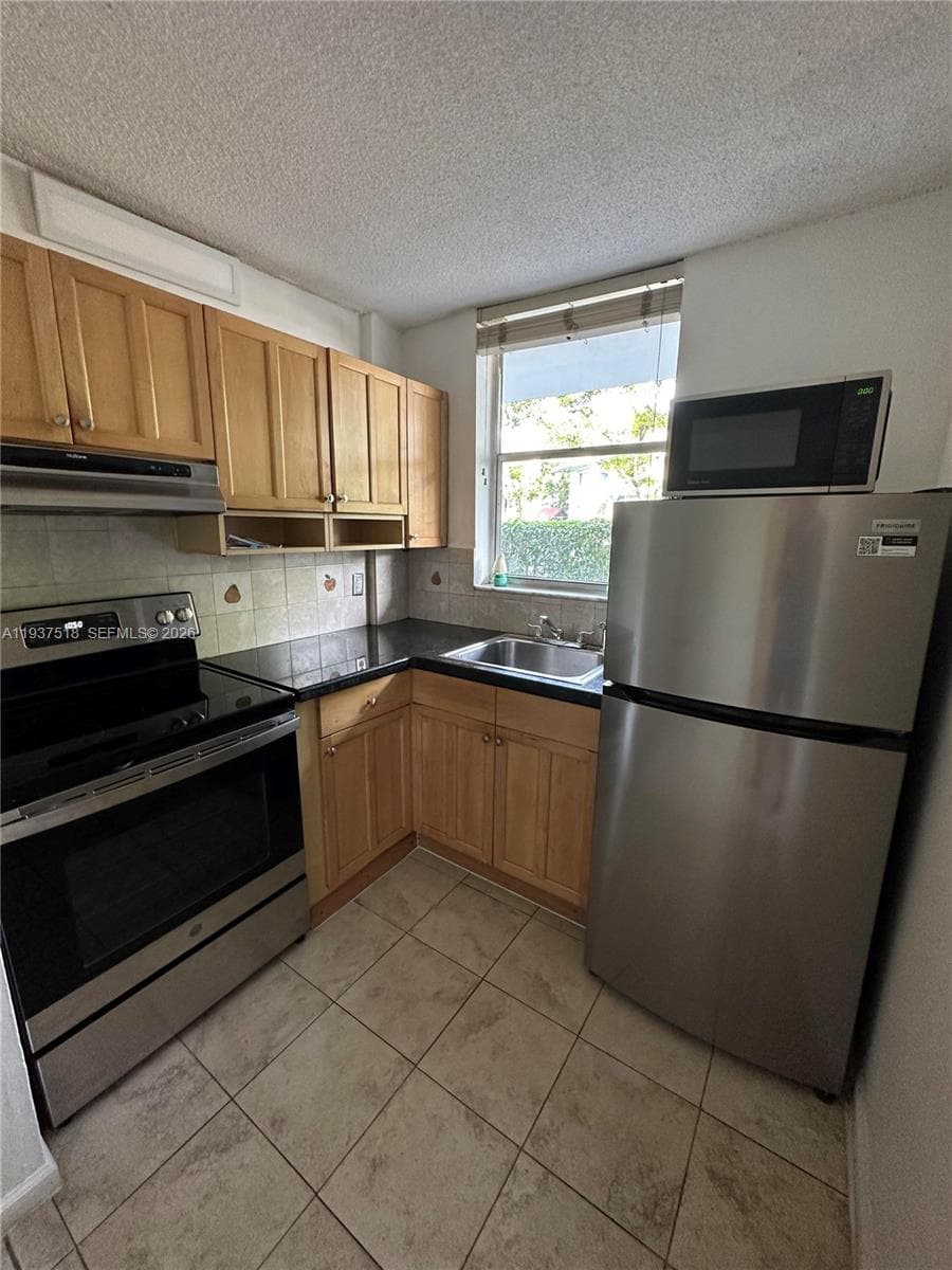North Bay Villas Condo · #102 in North Bay Village - Photo 1