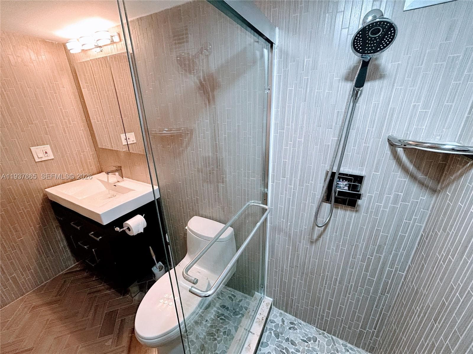 river rock stone shower pan detail