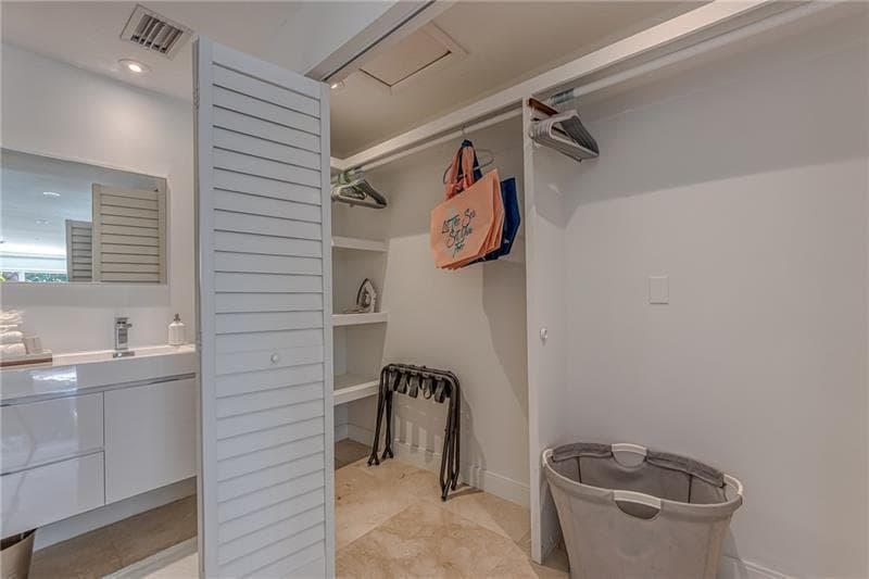 Spacey closet in primary bedroom