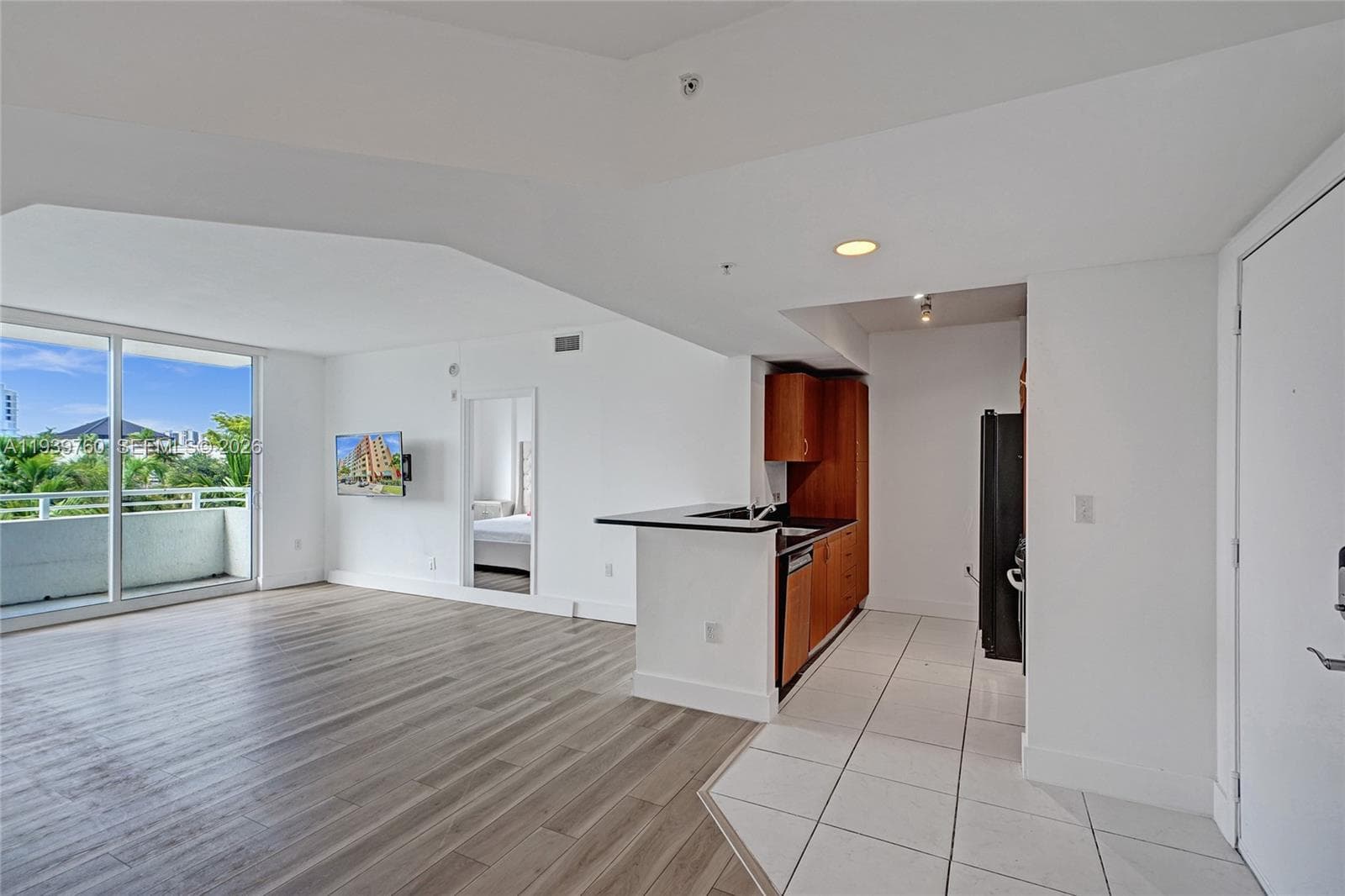 SPECIAL PRICE!!! Buy a 2-BEDROOM Deal – Priced Like a 1-Bedroom at 2775 NE 187TH ST #202 — PRICE, LOCATION! Walking distance to Publix, parks, shops, and synagogues — everything you need just steps away! Step into this beautifully updated apartment offering: spacious bedrooms, each with walk-in closets,A modern kitchen with granite countertops and stainless steel appliances, Laminate flooring throughout, In-unit washer and dryer.Enjoy resort-style amenities, including:4 infinity pools with cabanas,State-of-