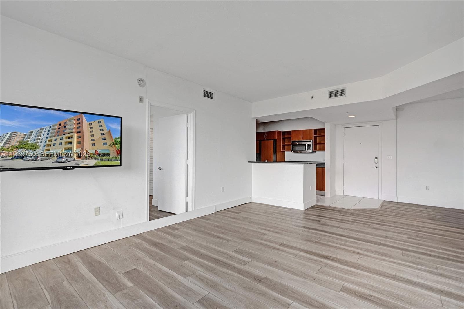SPECIAL PRICE!!! Buy a 2-BEDROOM Deal – Priced Like a 1-Bedroom at 2775 NE 187TH ST #202 — PRICE, LOCATION! Walking distance to Publix, parks, shops, and synagogues — everything you need just steps away! Step into this beautifully updated apartment offering: spacious bedrooms, each with walk-in closets,A modern kitchen with granite countertops and stainless steel appliances, Laminate flooring throughout, In-unit washer and dryer.Enjoy resort-style amenities, including:4 infinity pools with cabanas,State-of-