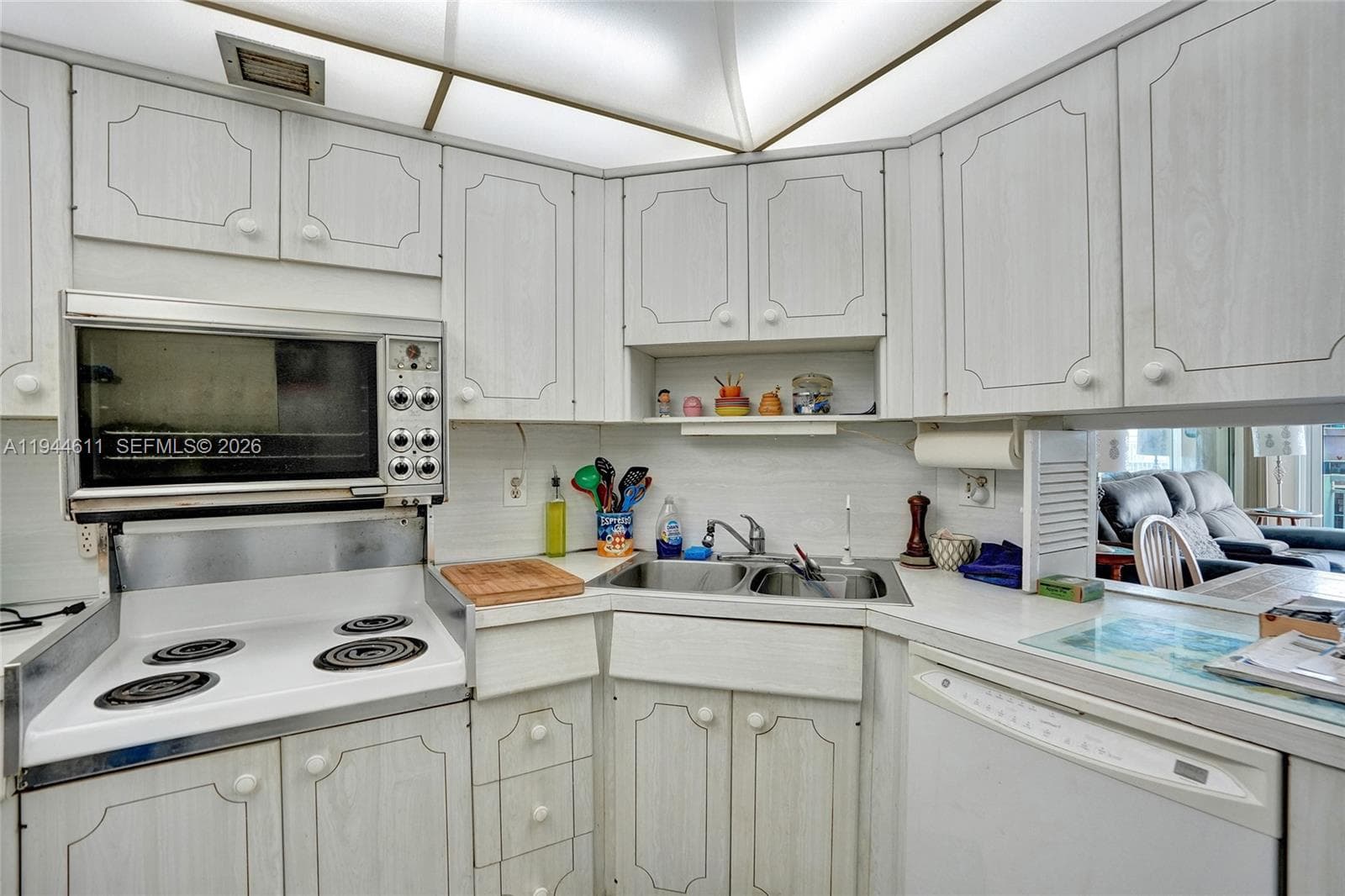 Contemporary white, transitional kitchen.
