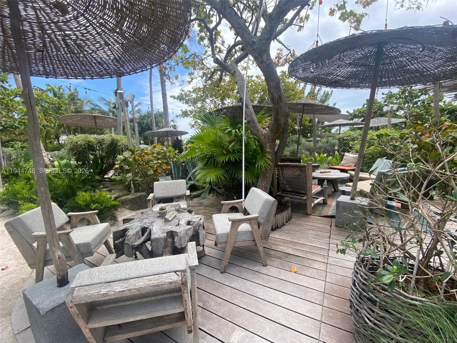 Tulum style bar and restaurant in back yard.