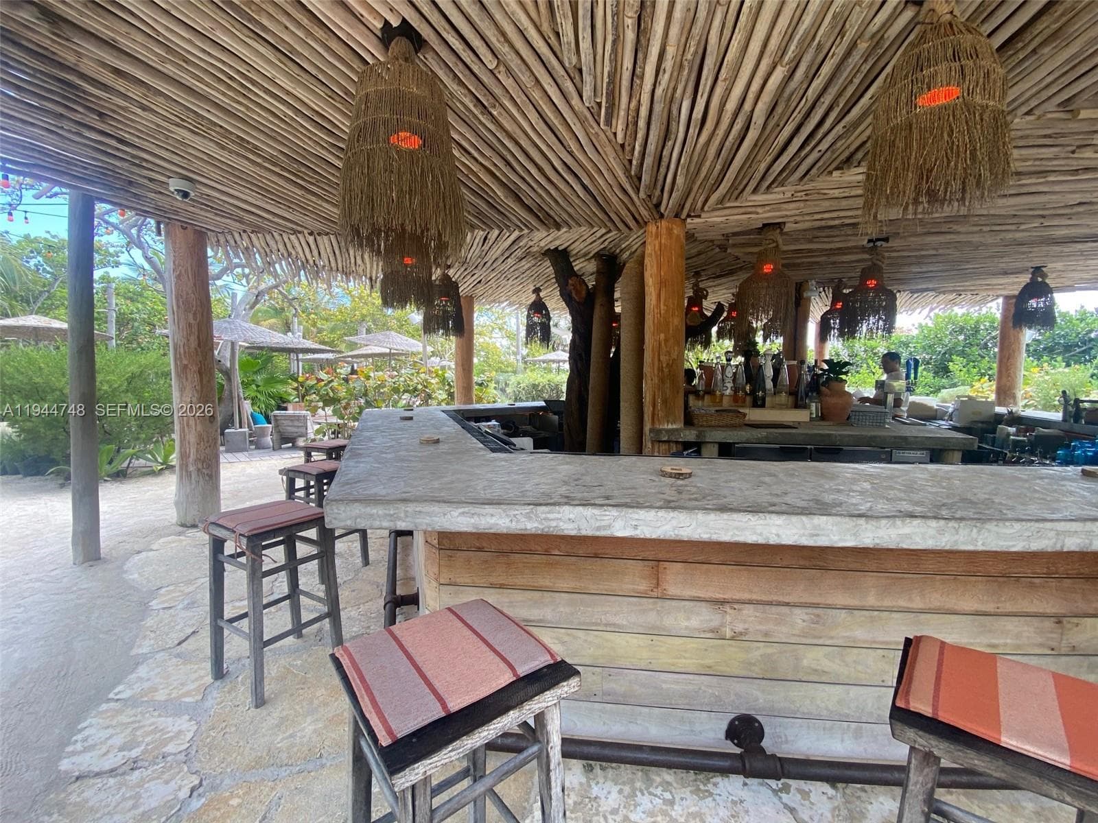 Tulum style bar in yard.
