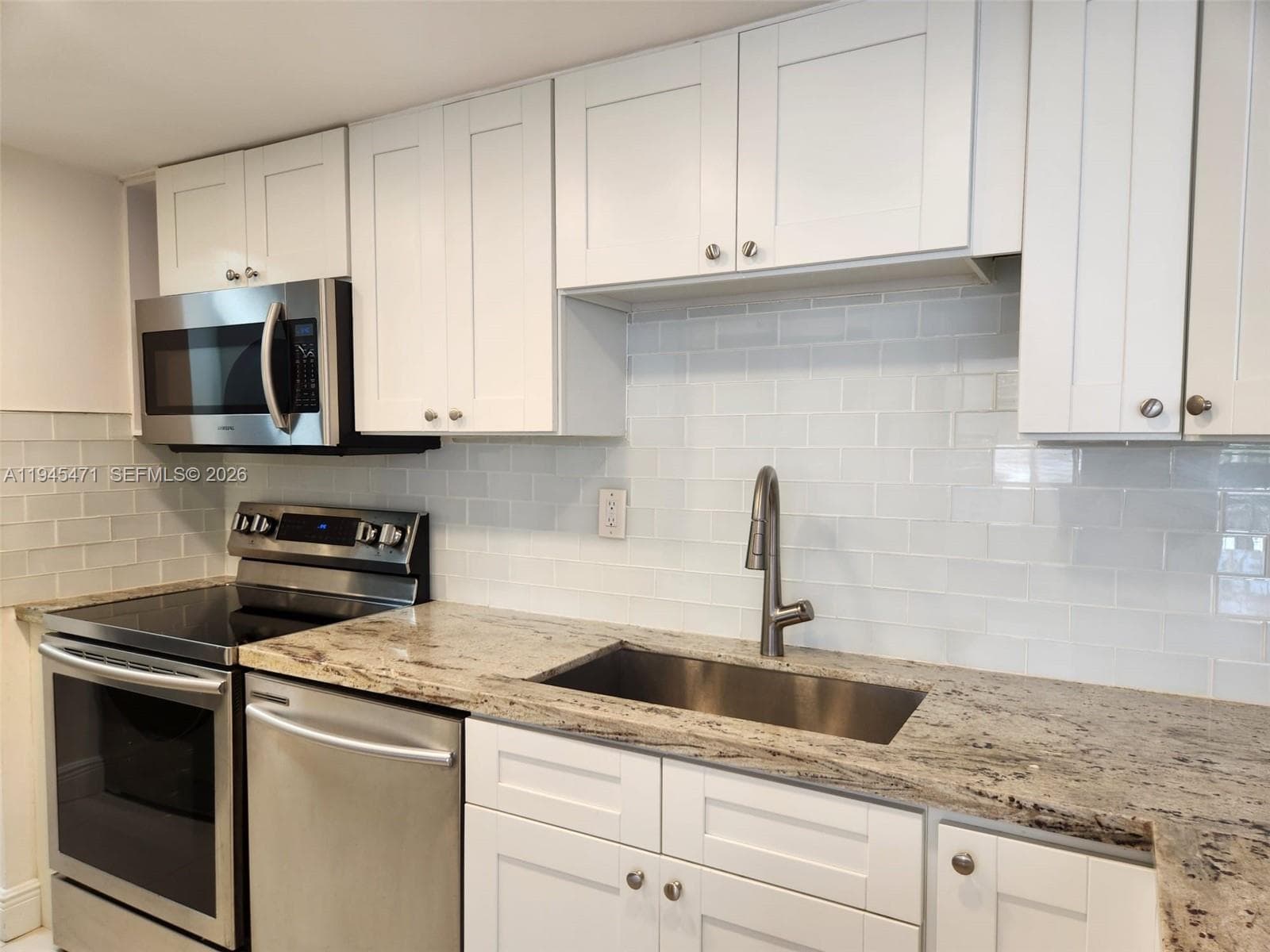 Additional view of kitchen.