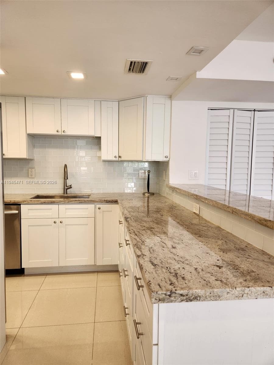 Additional view of kitchen.