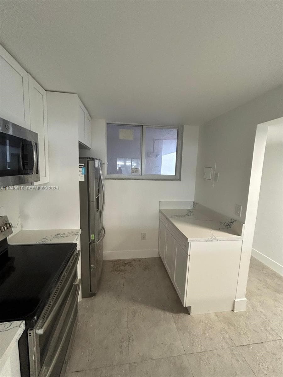 WEST BAY GARDENS CONDO · #210 in Miami Beach - Photo 25