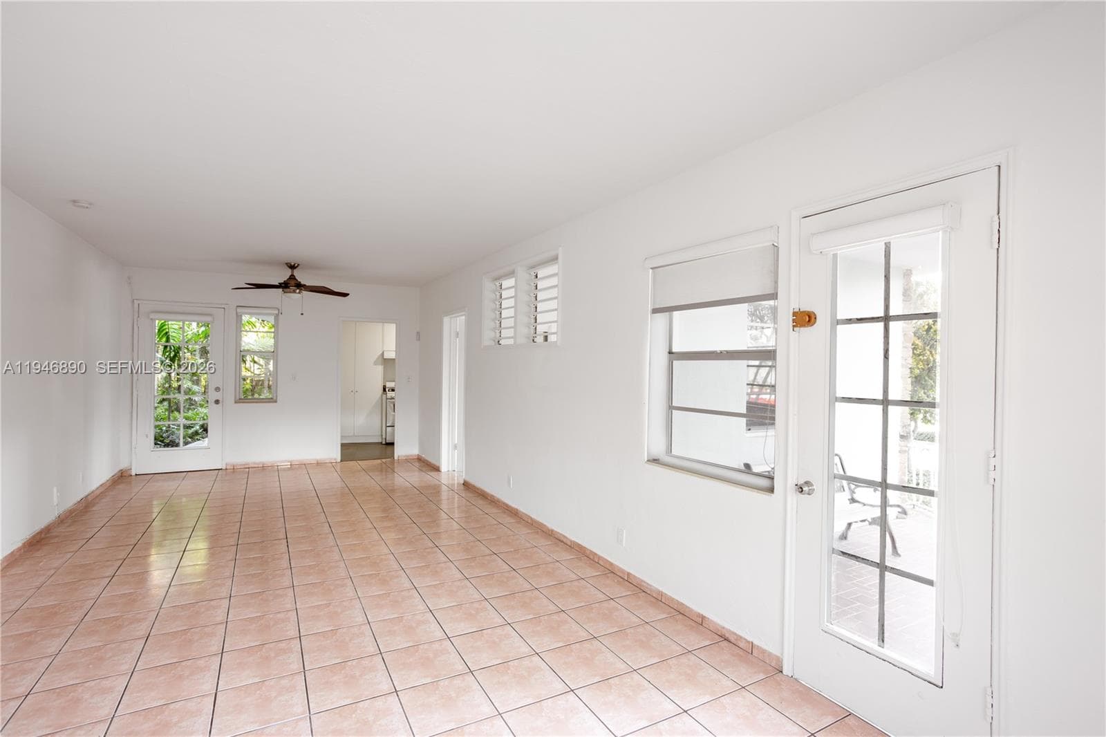 Doors to kitchen and  interior garden