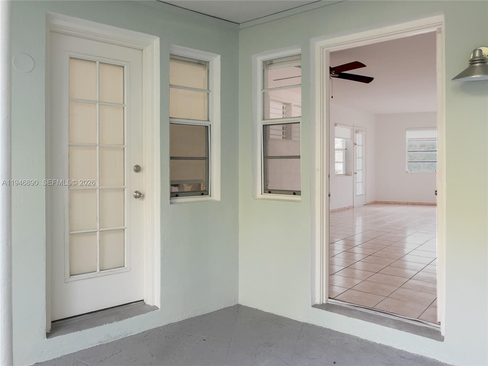 Entry from indoor garden and main building
