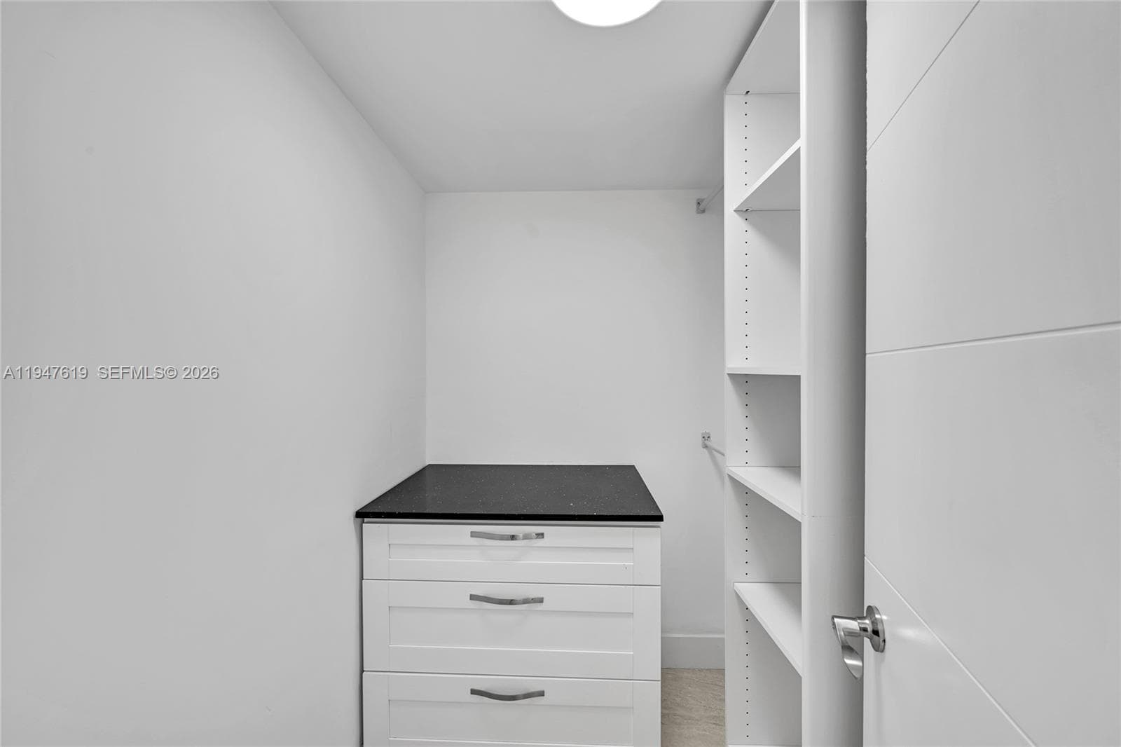 Custom closet with built-in shelving and storage