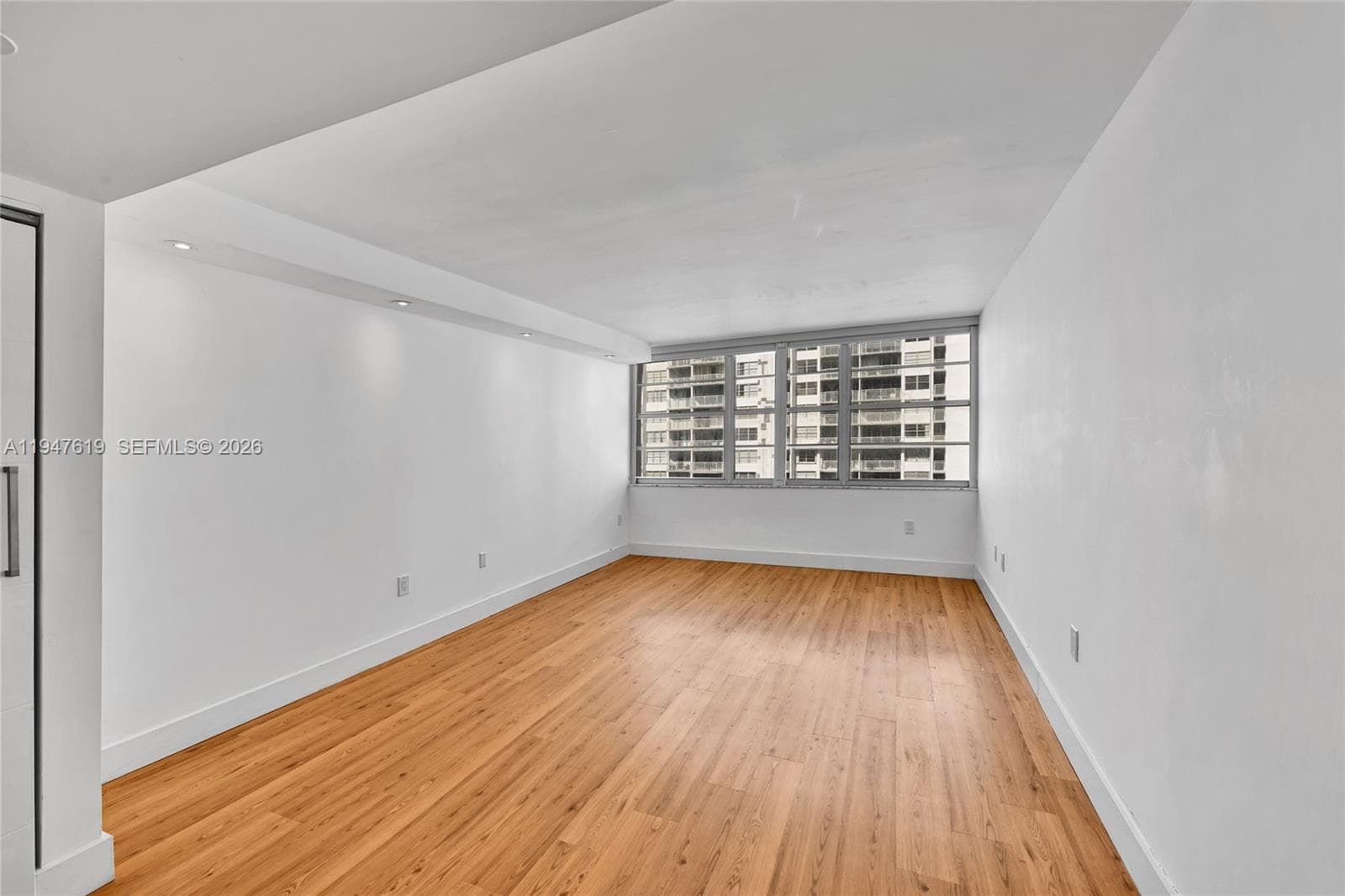 Spacious primary suite with tranquil views