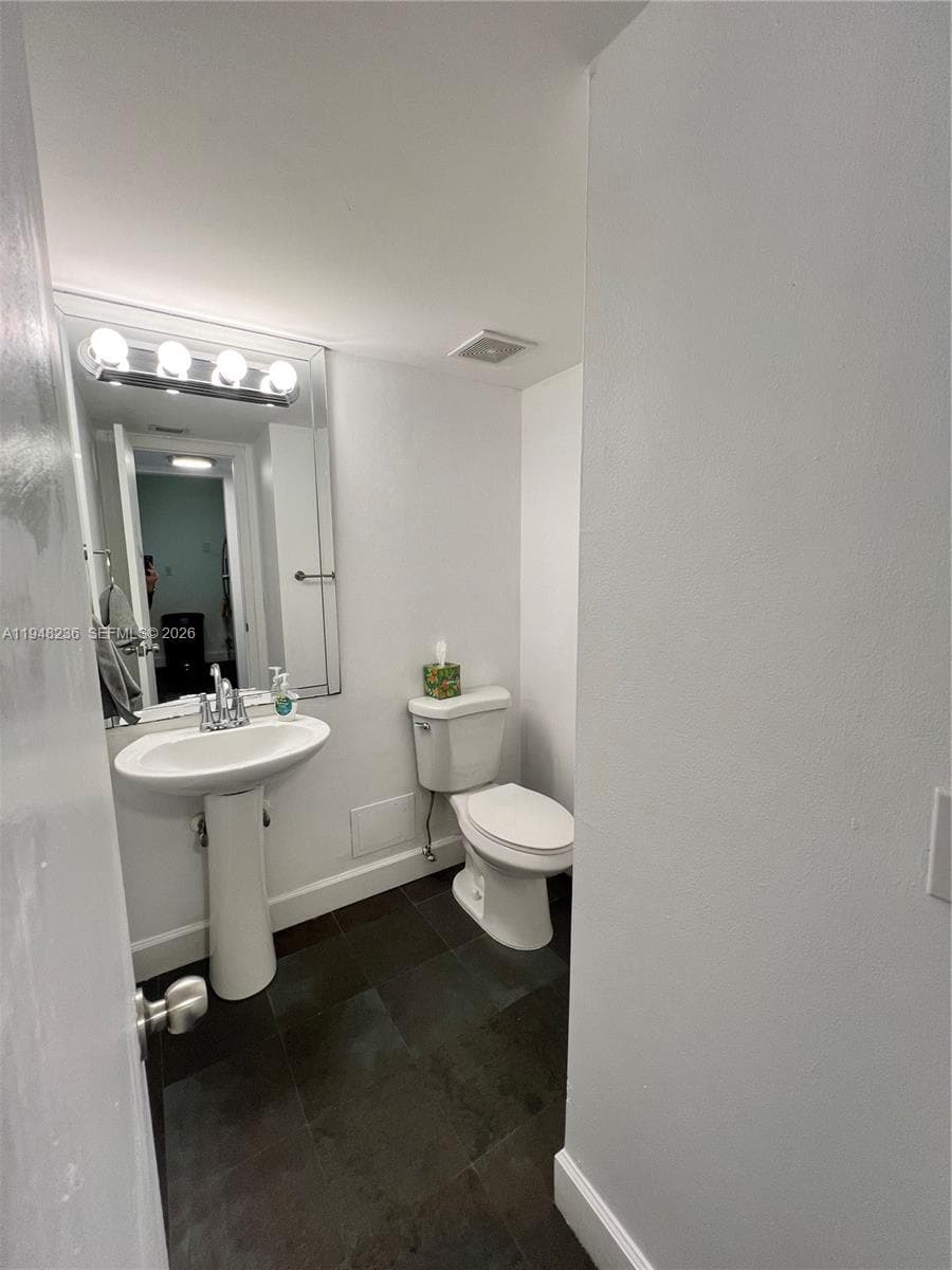 half bathroom near front door