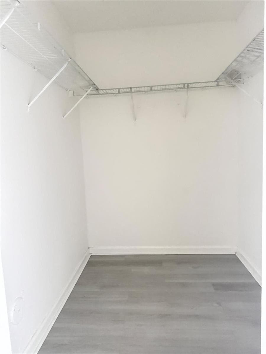 Walking closet in master bedroom