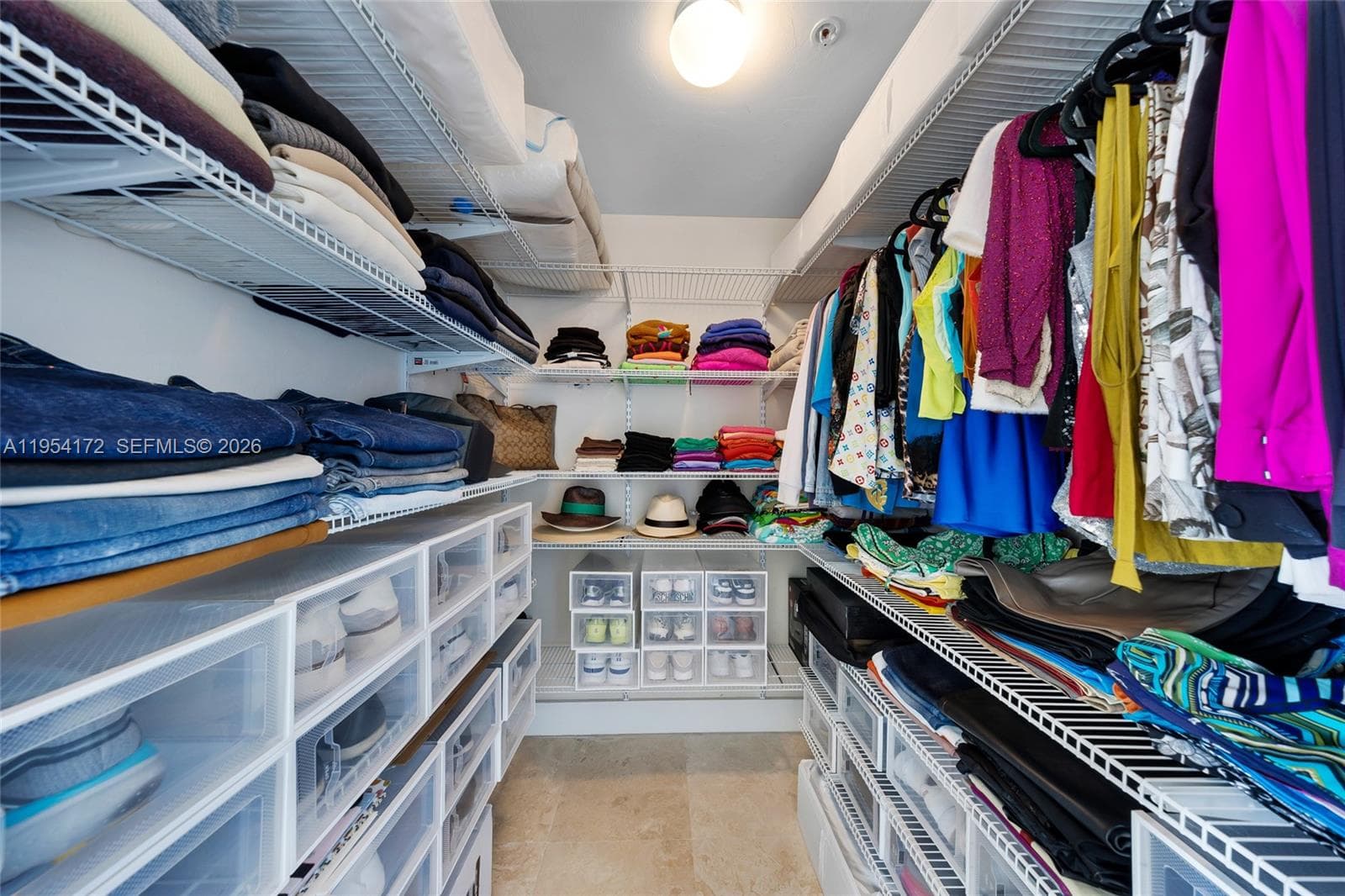 Primary walk in left closet