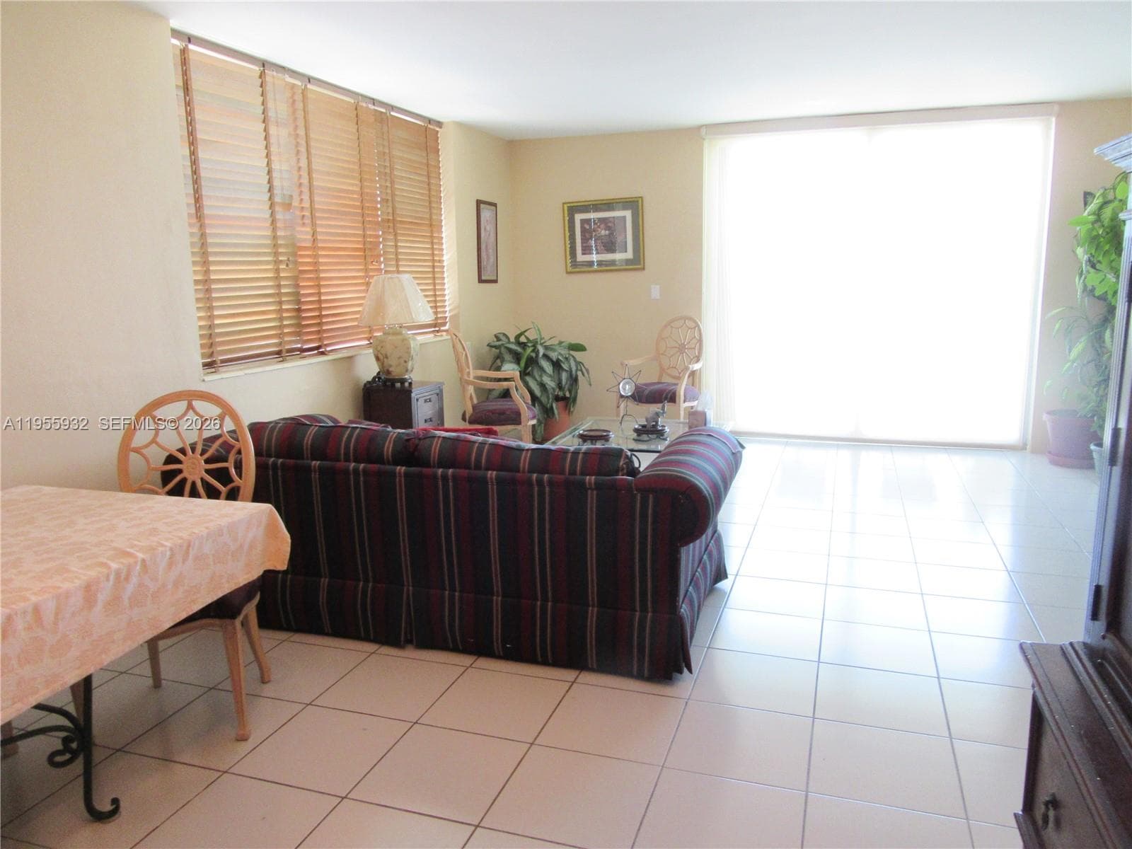 Unit kitchen has refrigerator, e-stove/oven and microwave.